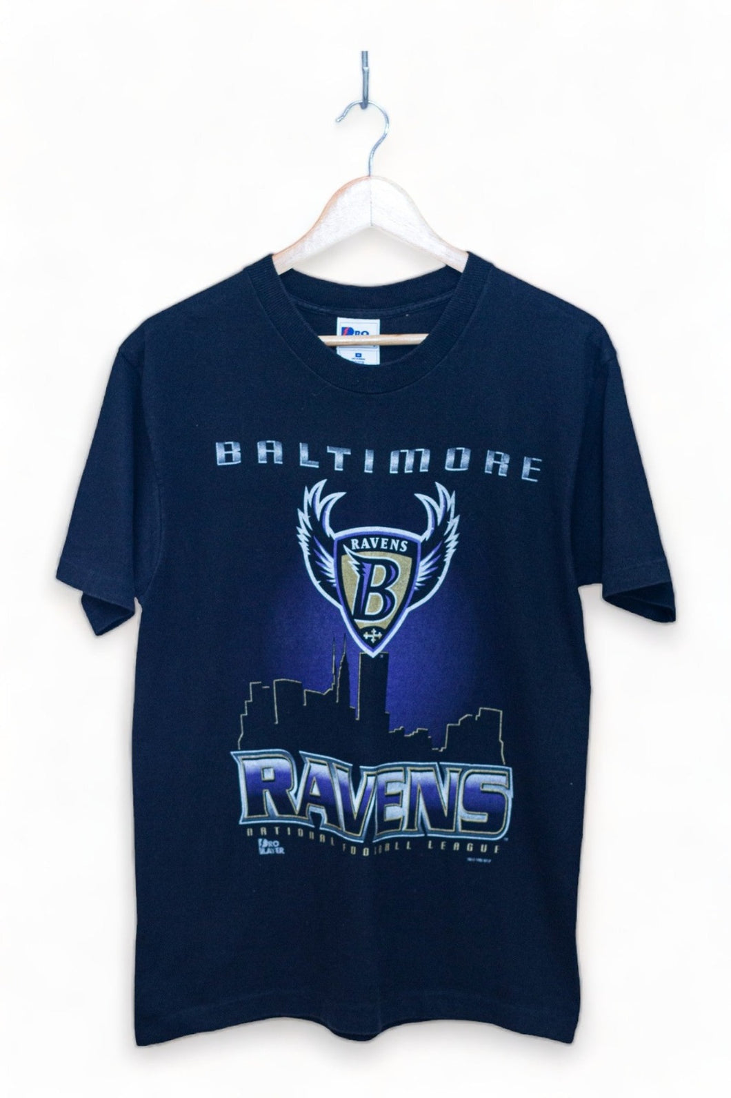 Discover the essence of Baltimore Ravens history with our vintage team logo featuring a captivating cityscape backdrop. Unveil the spirit of champions with this exclusive Pro Player tag, celebrating the legacy of the Ravens. Elevate your fan experience with this iconic emblem, meticulously crafted to embody the pride and strength of Baltimore's football tradition.