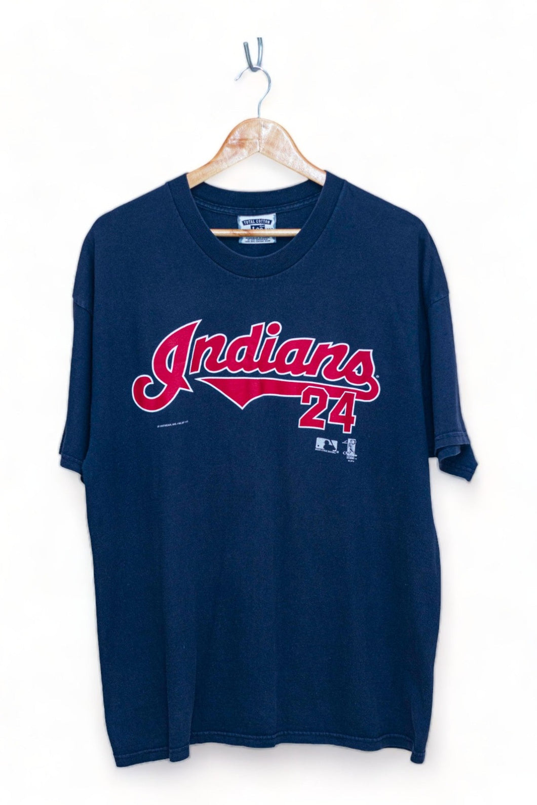 Unearth the charm of the game with the limited edition Faded Navy #24 Manny Ramirez Cleveland Indians Player 1990's MLB T-Shirt. This classic sportswear masterpiece pays homage to a time-honored era in baseball history, delivering a vintage fashion statement that transcends the ordinary. Elevate your style game with this limited edition gem, seamlessly blending classic sportswear aesthetics and vintage sports apparel charm for a truly timeless addition to your collection.
